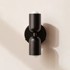 Modern minimalist cylinder LED wall sconce, 2-light iron fixture with warm white glow