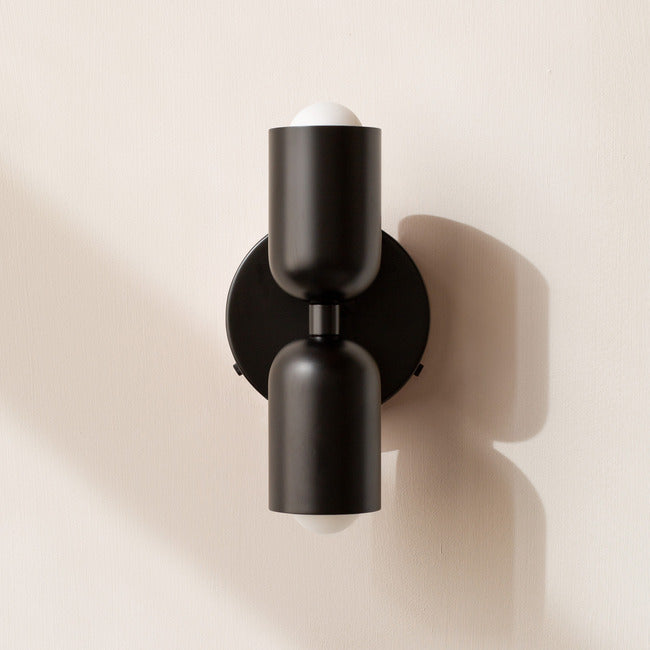 Modern minimalist cylinder LED wall sconce, 2-light iron fixture with warm white glow