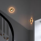 Round wall sconce with brass and glass shade, minimalist LED 1-light indoor fixture