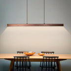 Modern linear LED pendant light in black metal with acrylic shade, dimmable, dining room