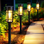 Solar garden lights 8-pack with glass shade and stainless steel pole, pathway stake installation