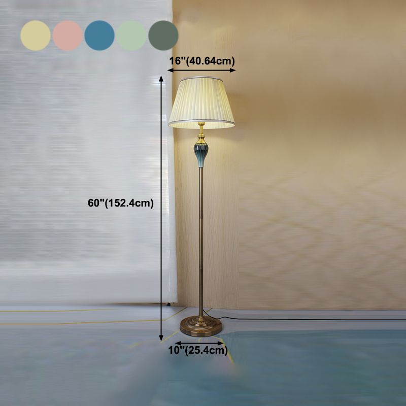 Floor lamp with fabric dome shade and metal base, available in multi colour options for bedroom
