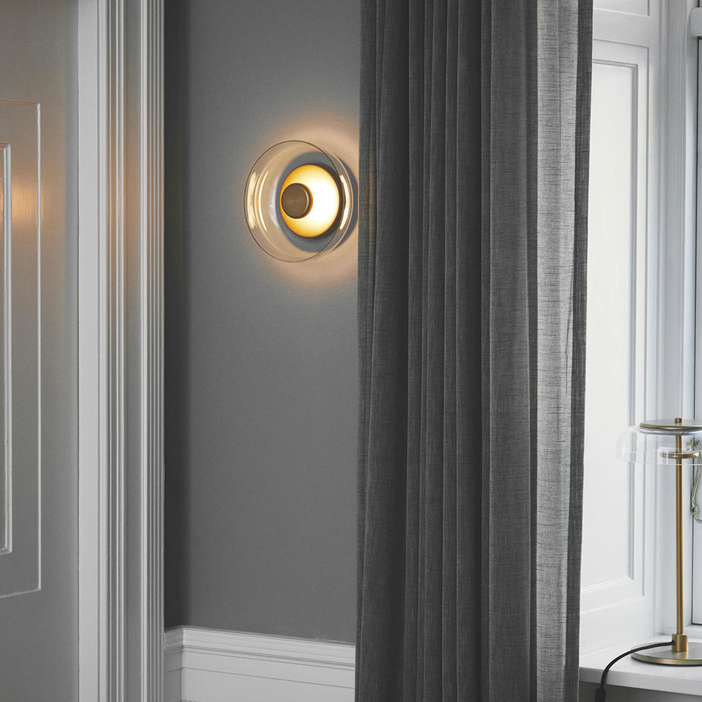 Round wall sconce with brass and glass shade, minimalist LED 1-light indoor fixture