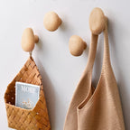 Wooden wall hooks set pebble shape, set of 4, coat and bag hanger, walnut or beech