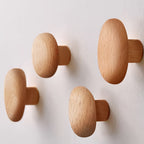 Wooden wall hooks set pebble shape, set of 4, coat and bag hanger, walnut or beech