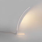 Arc LED dimmable table lamp in black or white, modern minimalist design, 3000K–6000K