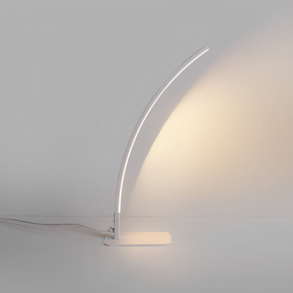 Arc LED dimmable table lamp in black or white, modern minimalist design, 3000K–6000K