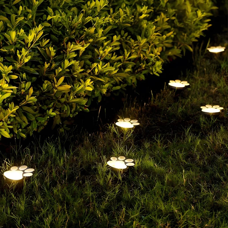 Solar paw print outdoor garden light, waterproof IP44, LED warm white glow