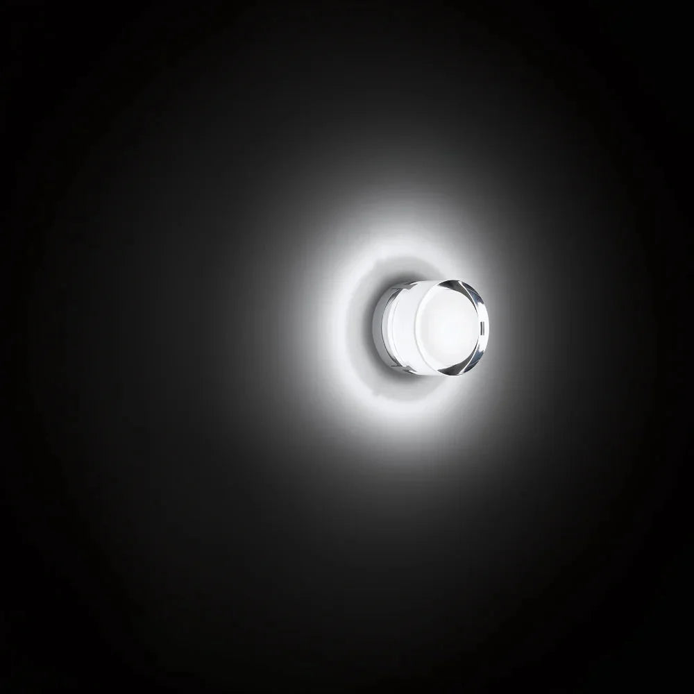 Wall lamp with sculptural glass shade and integrated dusk-to-dawn LED sensor, minimalist modern style